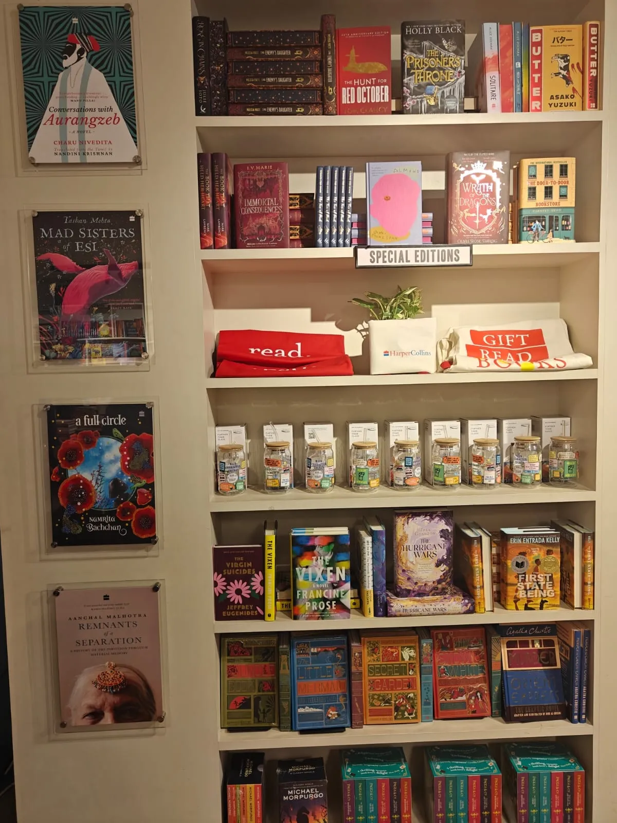 A HarperCollins India “Special Editions” bookshop display wall of hardcovers, tote bags and merchandise.